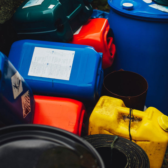 Empty gas canisters in bin 