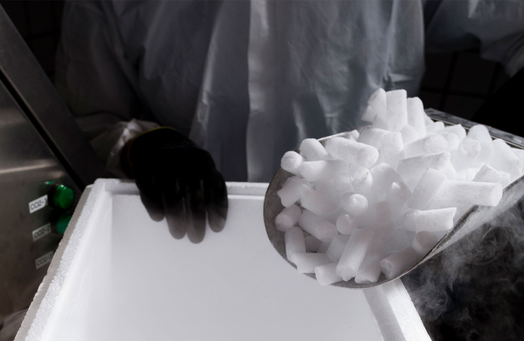Scooping dry ice into esky
